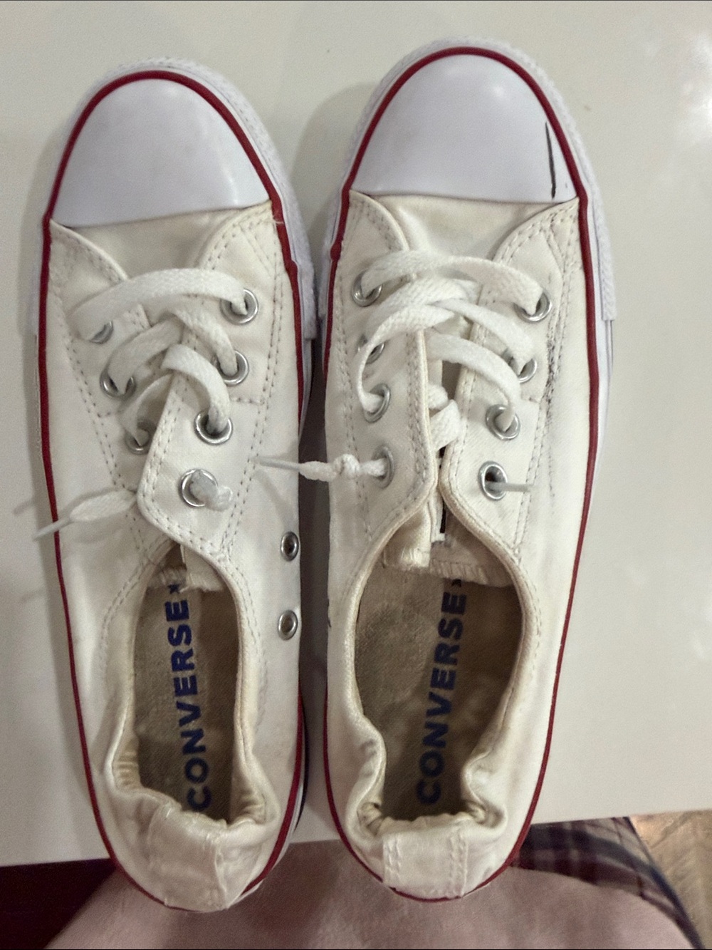 Converse women’s White Canvas Low Top Sneakers with Red Trim